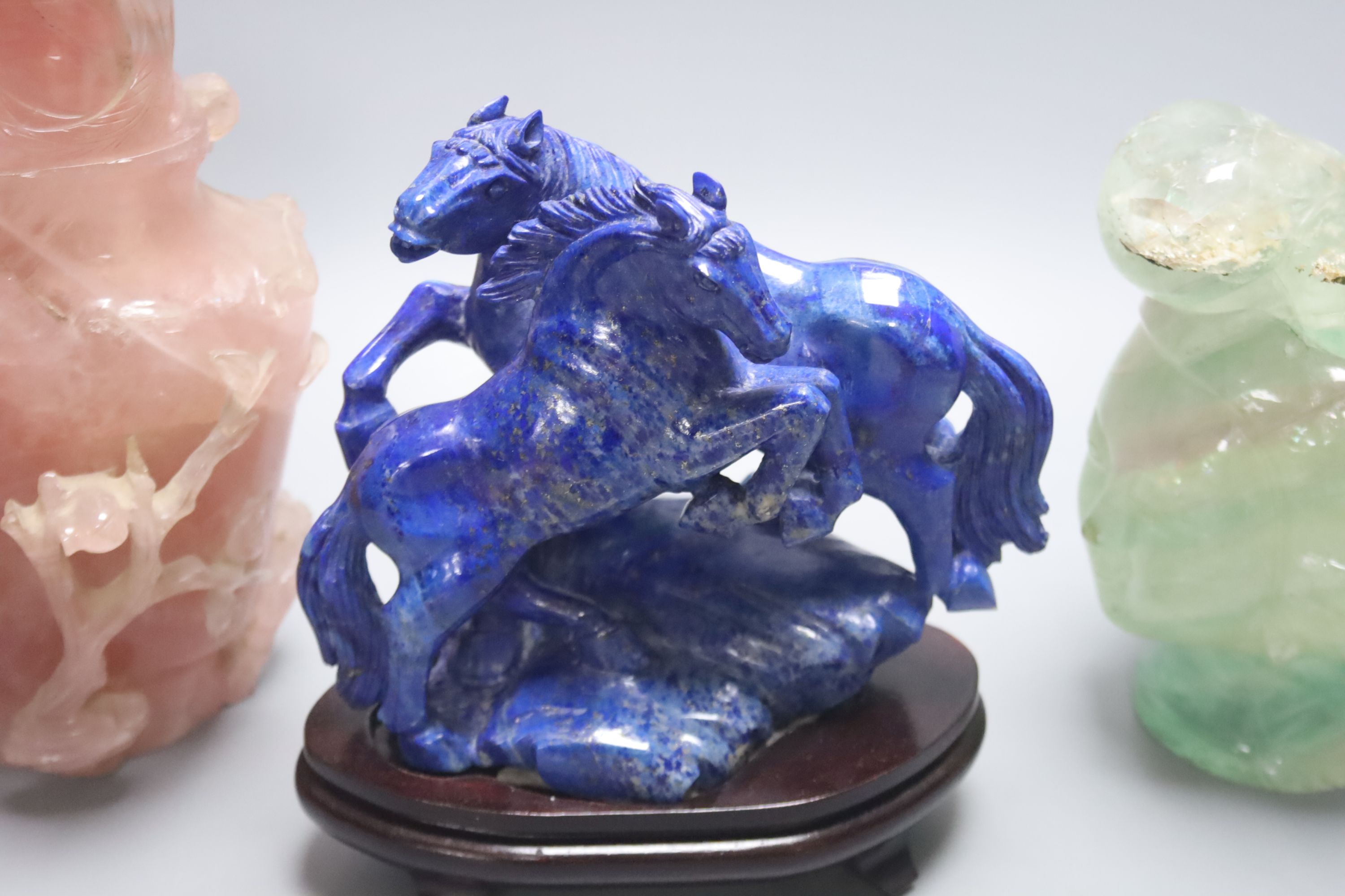 Five Chinese hardstone carvings, tallest 23.5cm